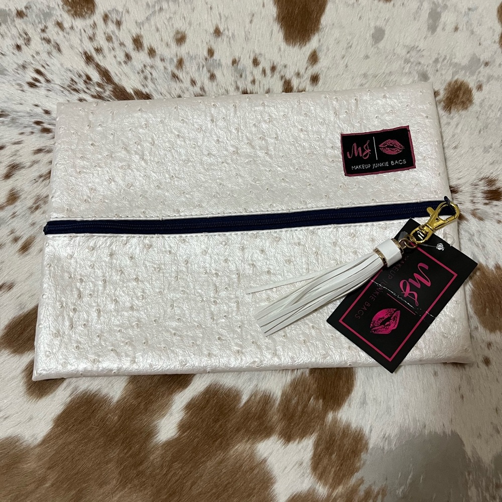 NWT Makeup Junkie size medium White Textured Clutch with Tassel